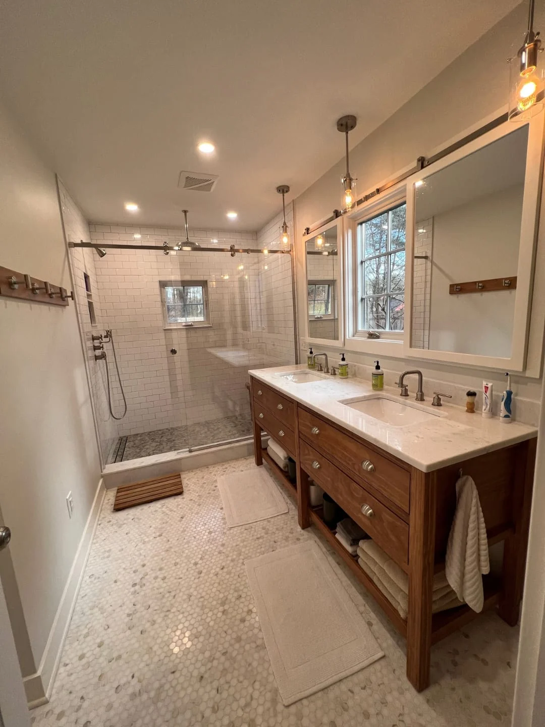 Master bathroom remodel with a double vanity and tiled shower